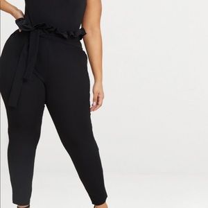 Black paper bag skinny pants